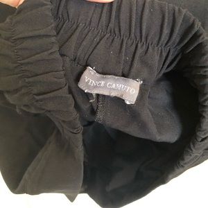 Pants with hem and stretch on back